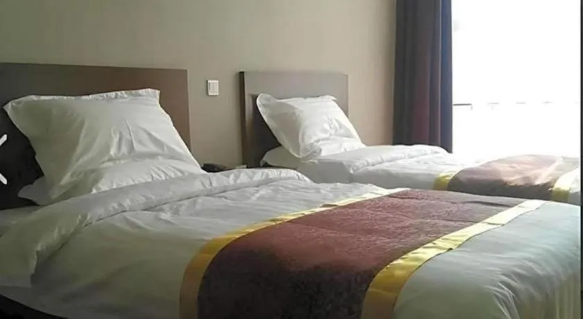 Bed in Beijing Jinjiang Fuyuan Hotel