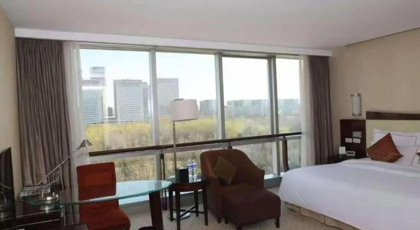 Bed in Beijing Jinjiang Fuyuan Hotel