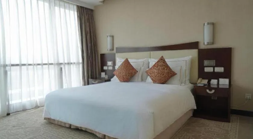 Bed in Beijing Jinjiang Fuyuan Hotel