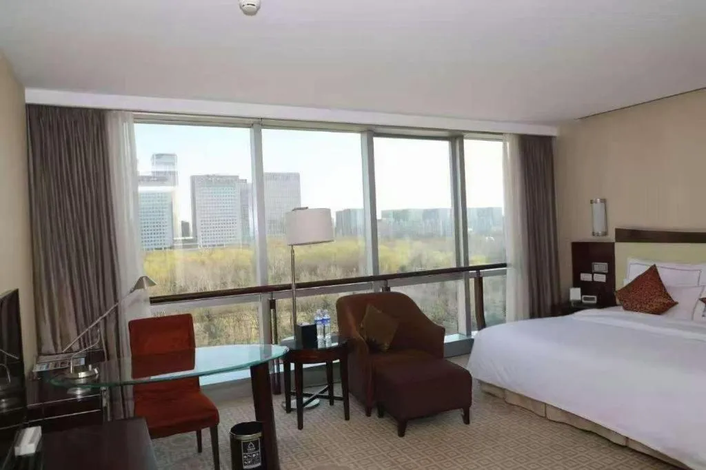 Bed in Beijing Jinjiang Fuyuan Hotel