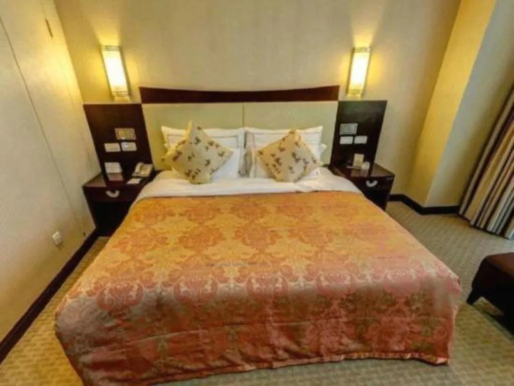 Bed in Beijing Jinjiang Fuyuan Hotel