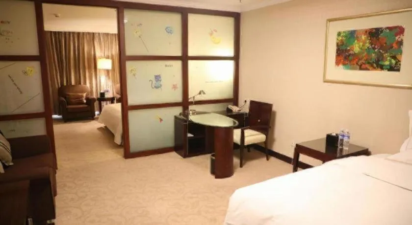 Bed in Beijing Jinjiang Fuyuan Hotel