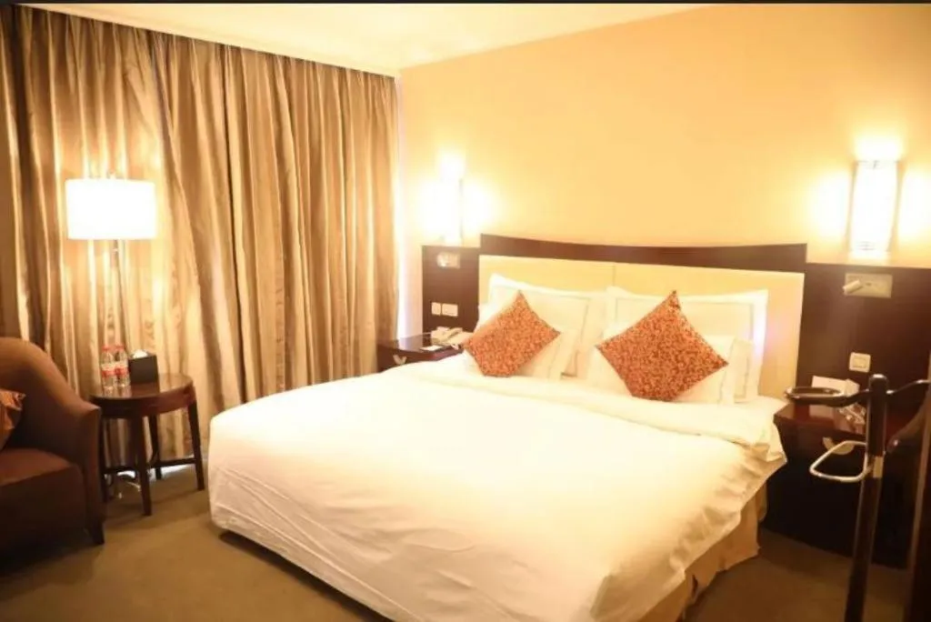 Bed in Beijing Jinjiang Fuyuan Hotel