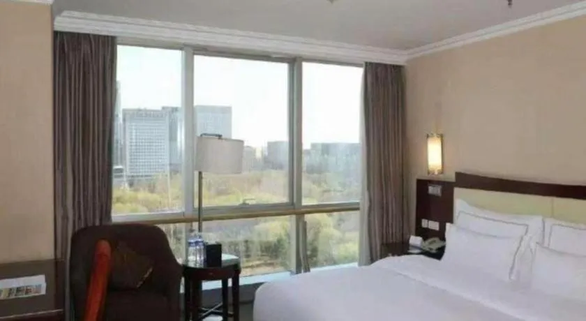 Bed in Beijing Jinjiang Fuyuan Hotel