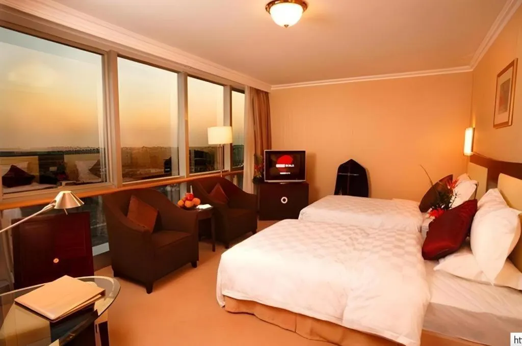 Bed in Beijing Jinjiang Fuyuan Hotel