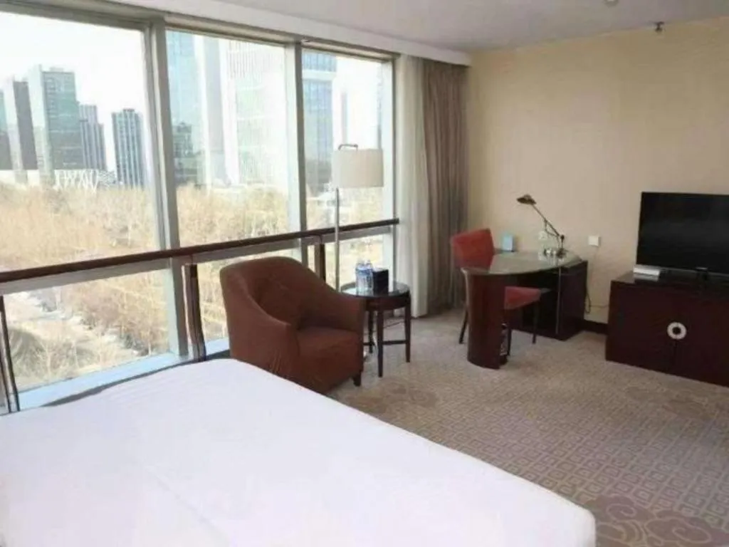 Bed in Beijing Jinjiang Fuyuan Hotel