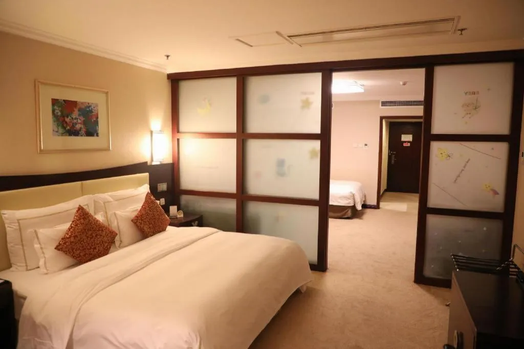 Bed in Beijing Jinjiang Fuyuan Hotel