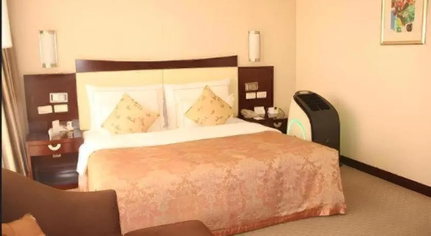 Bed in Beijing Jinjiang Fuyuan Hotel