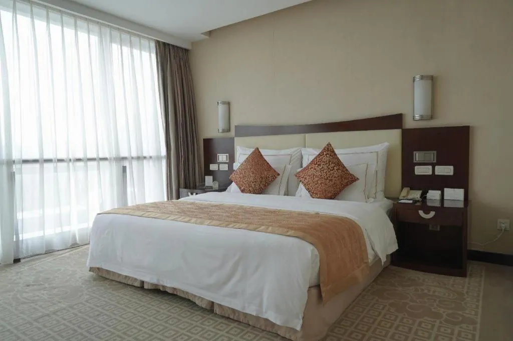 Bed in Beijing Jinjiang Fuyuan Hotel