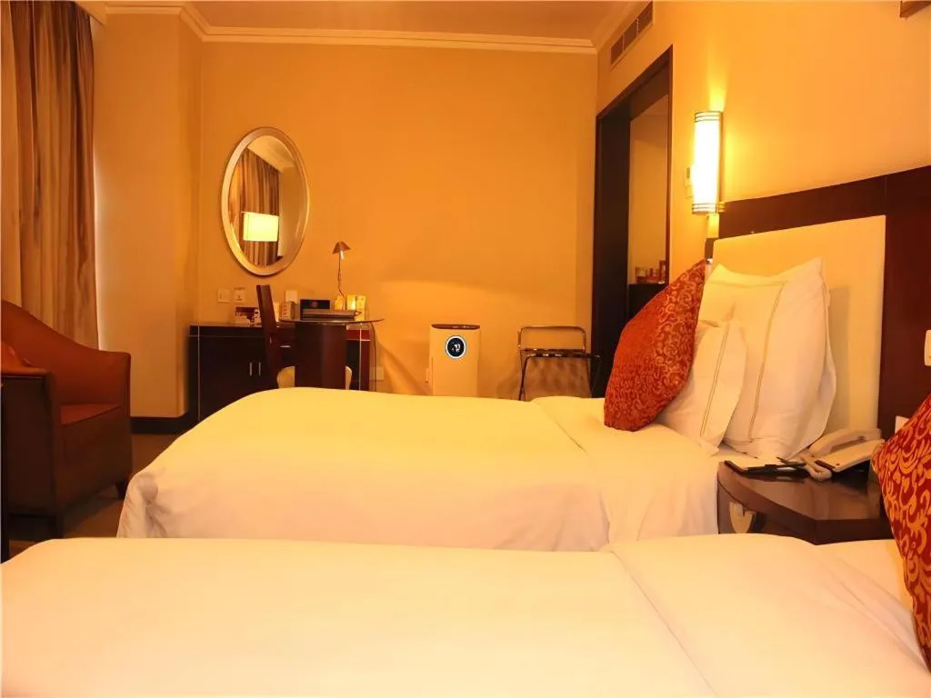 Bed in Beijing Jinjiang Fuyuan Hotel