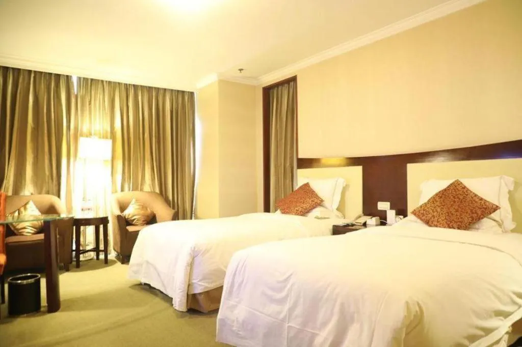 Bed in Beijing Jinjiang Fuyuan Hotel