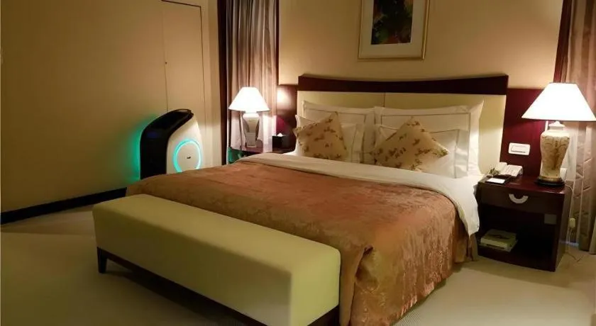 Bed in Beijing Jinjiang Fuyuan Hotel