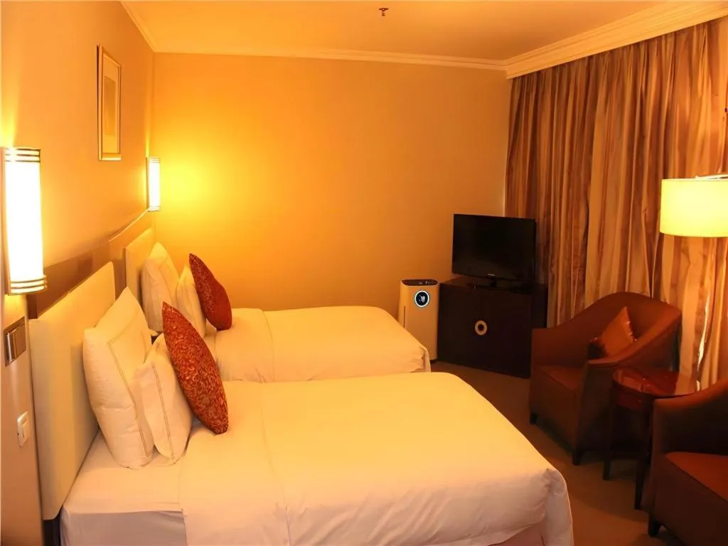 Bed in Beijing Jinjiang Fuyuan Hotel