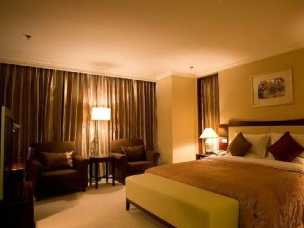 Bed in Beijing Jinjiang Fuyuan Hotel