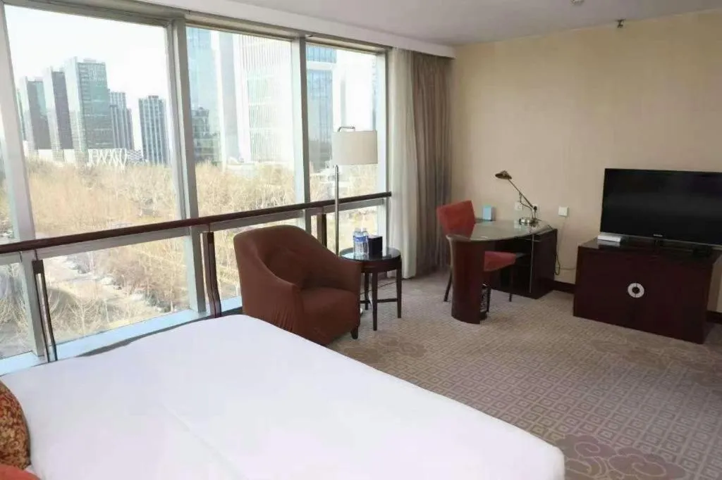 Bed in Beijing Jinjiang Fuyuan Hotel