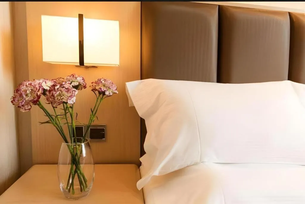 Bed in Beijing Jinjiang Fuyuan Hotel