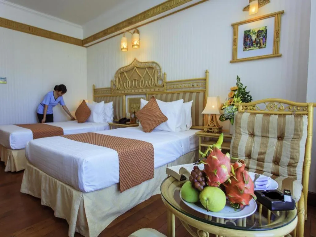 Bed in Senriver Hotel