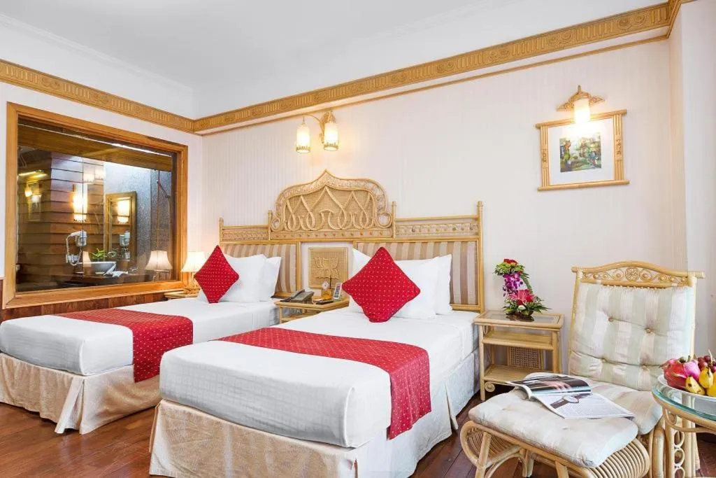 Bed in Senriver Hotel