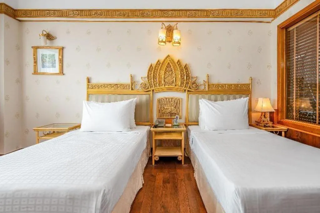 Bed in Senriver Hotel