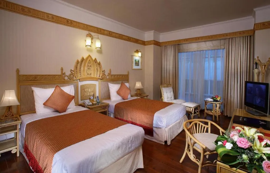 Bed in Senriver Hotel