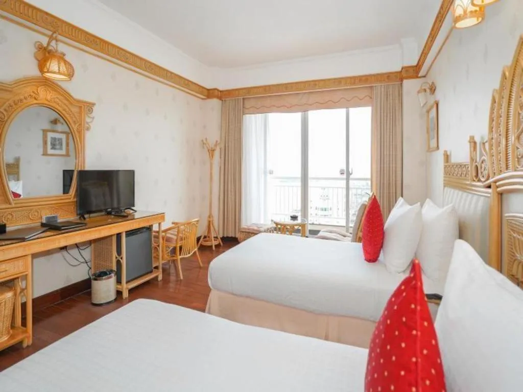 Bed in Senriver Hotel