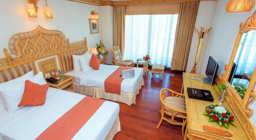 Bed in Senriver Hotel