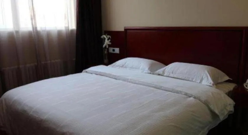 Bed in GreenTree Alliance Beijing Tiantan DonGMEn Hotel