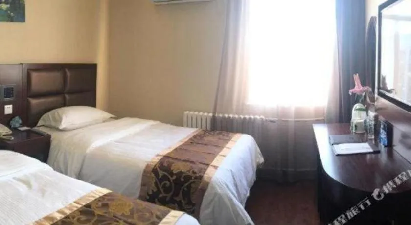 Bed in GreenTree Alliance Beijing Tiantan DonGMEn Hotel