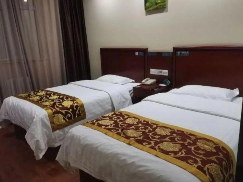 Bed in GreenTree Alliance Beijing Tiantan DonGMEn Hotel