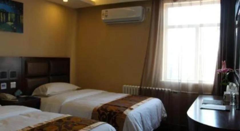 Bed in GreenTree Alliance Beijing Tiantan DonGMEn Hotel