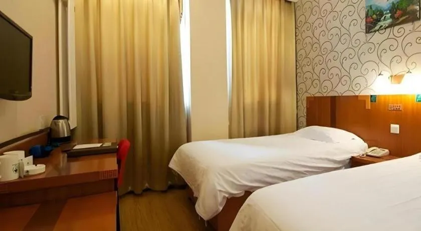 Bed in GreenTree Alliance Beijing Tiantan DonGMEn Hotel