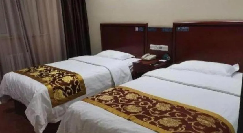 Bed in GreenTree Alliance Beijing Tiantan DonGMEn Hotel