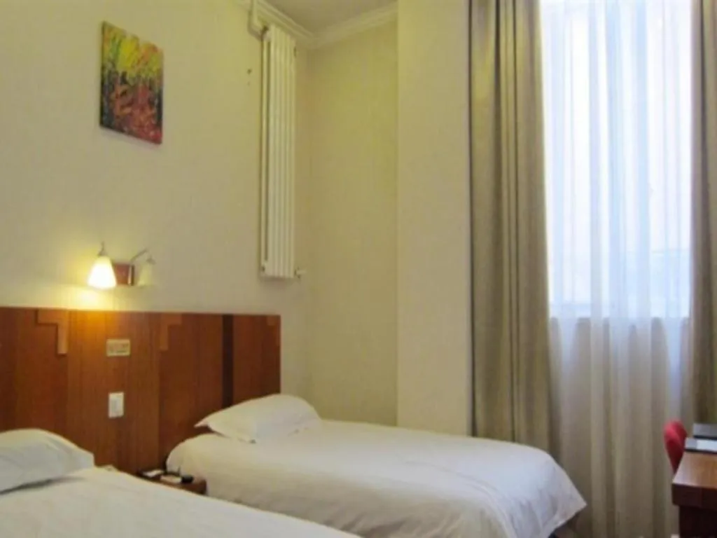 Bed in GreenTree Alliance Beijing Tiantan DonGMEn Hotel