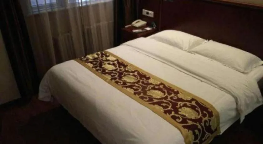 Bed in GreenTree Alliance Beijing Tiantan DonGMEn Hotel