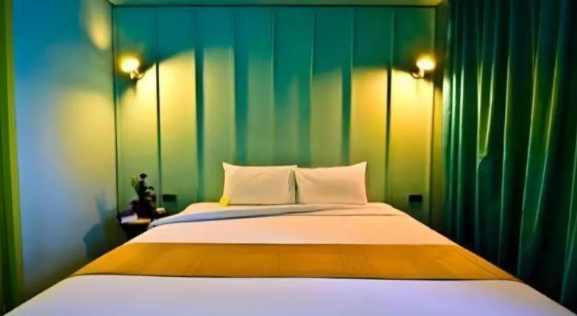 Bed in The Heritage Silom Hotel