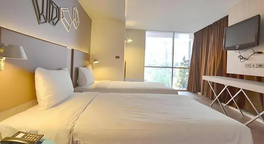 Bed in The Heritage Silom Hotel Bed in The Heritage Silom Hotel