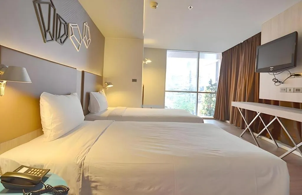 Bed in The Heritage Silom Hotel