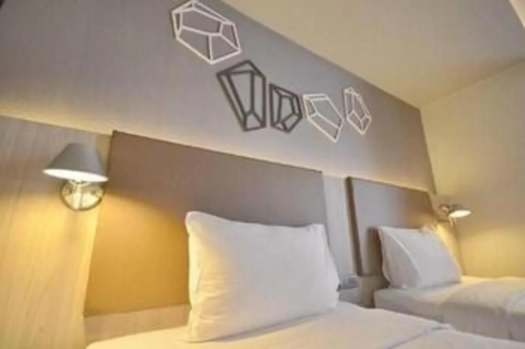 Bed in The Heritage Silom Hotel