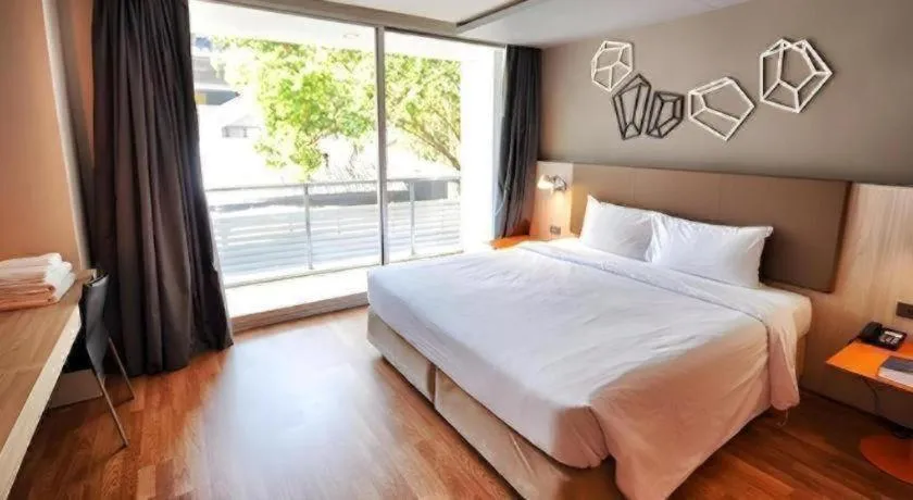 Bed in The Heritage Silom Hotel