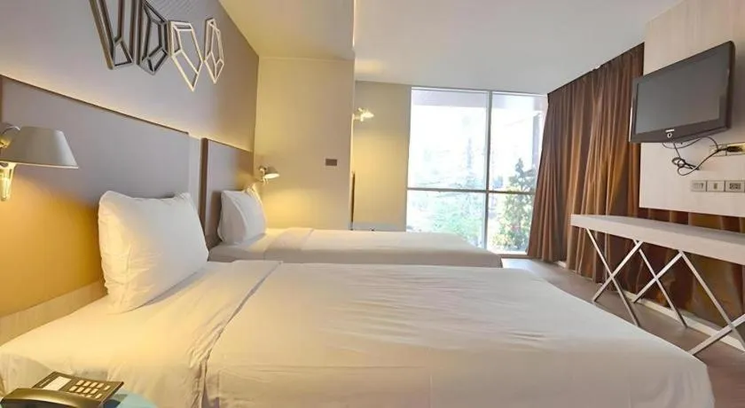 Bed in The Heritage Silom Hotel