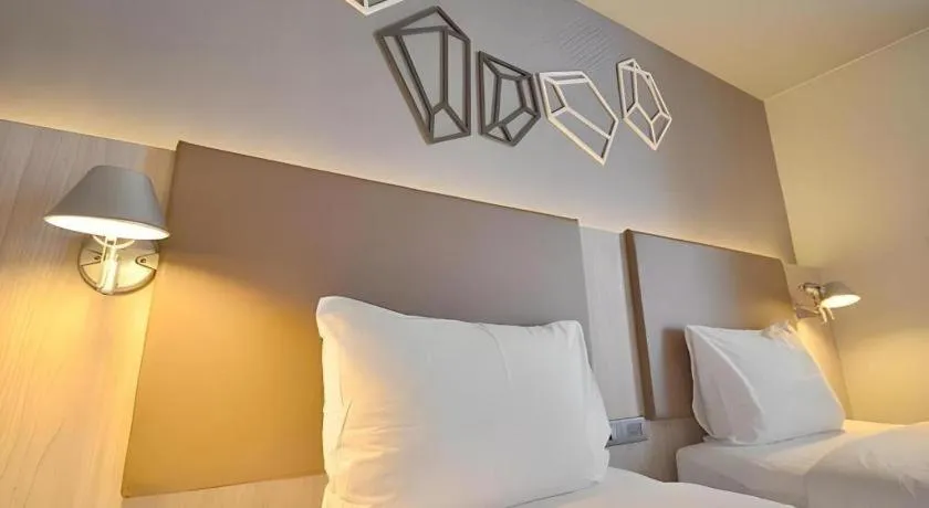 Bed in The Heritage Silom Hotel