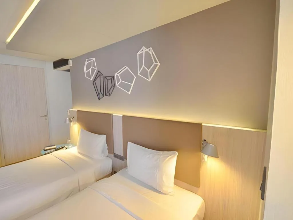 Bed in The Heritage Silom Hotel