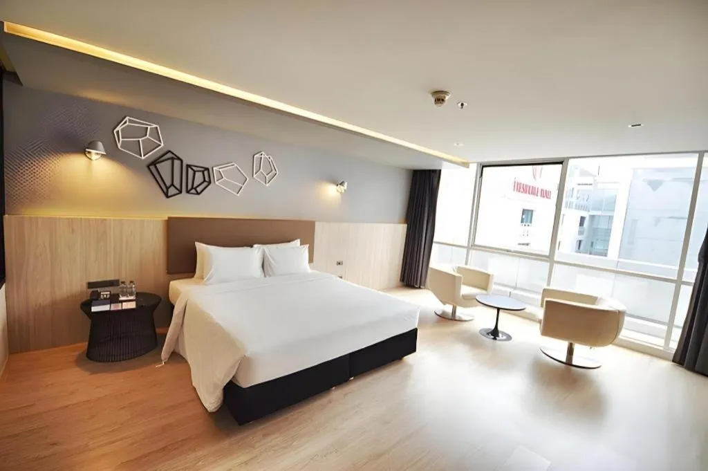 Bed in The Heritage Silom Hotel