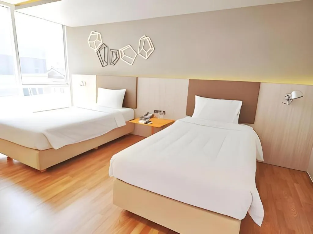 Bed in The Heritage Silom Hotel