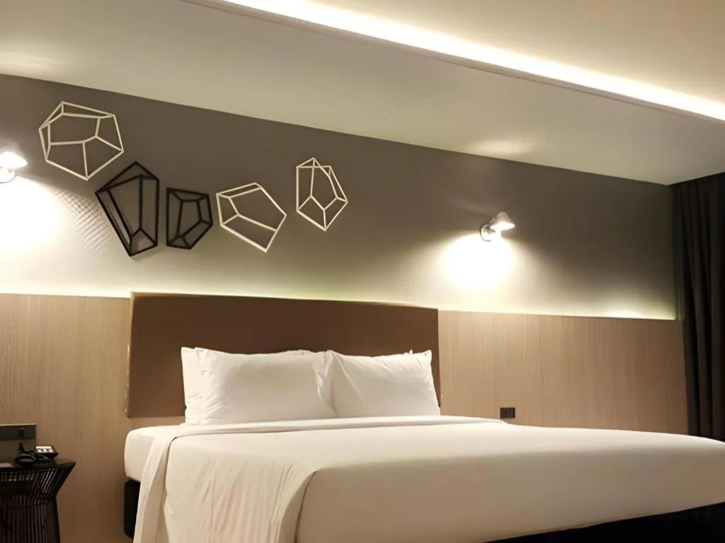 Bed in The Heritage Silom Hotel