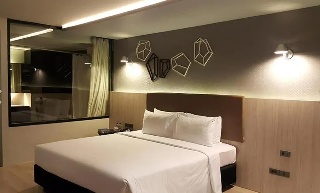 Bed in The Heritage Silom Hotel Bed in The Heritage Silom Hotel