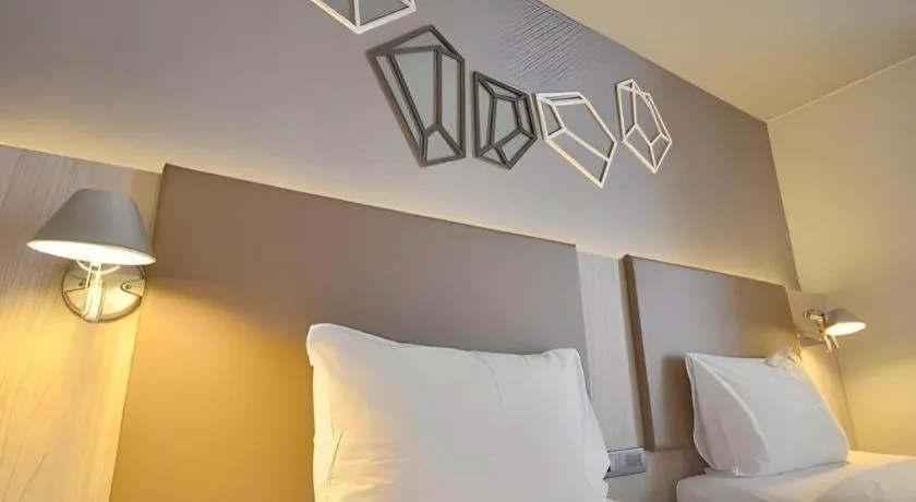 Bed in The Heritage Silom Hotel