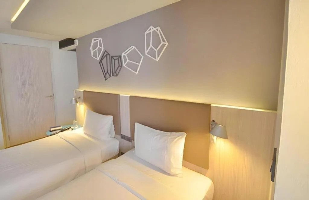 Bed in The Heritage Silom Hotel