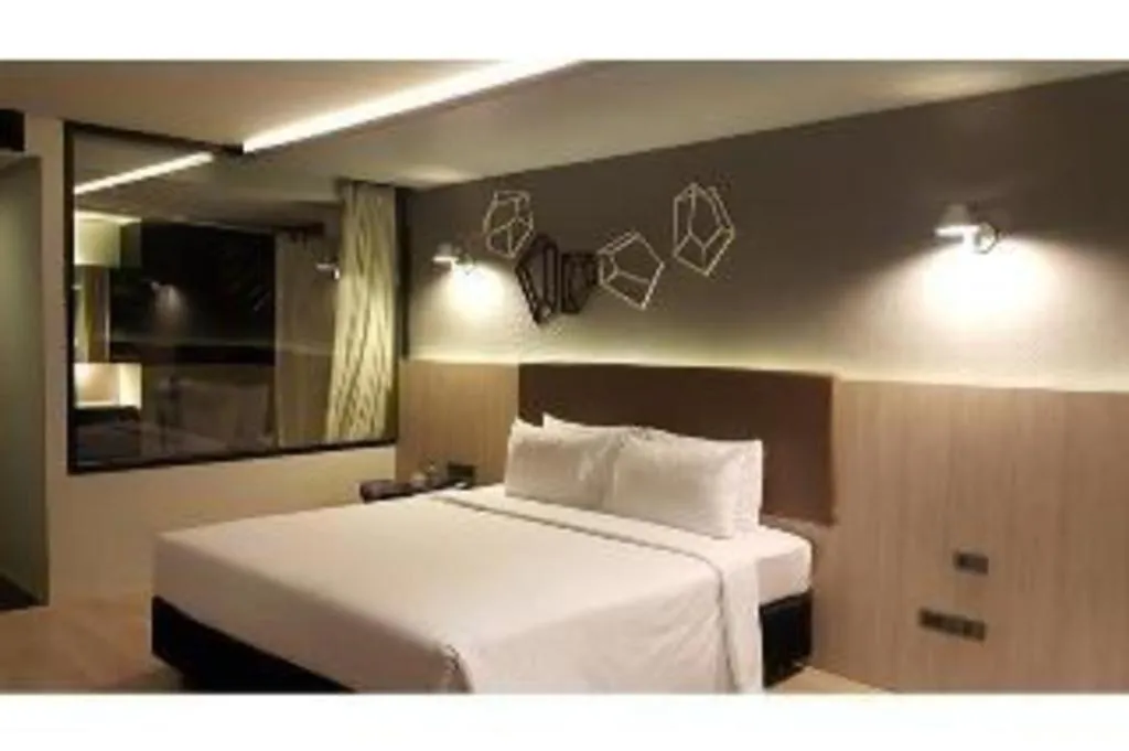 Bed in The Heritage Silom Hotel