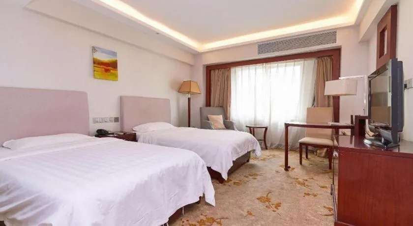 Bed in Starmoon Hotel